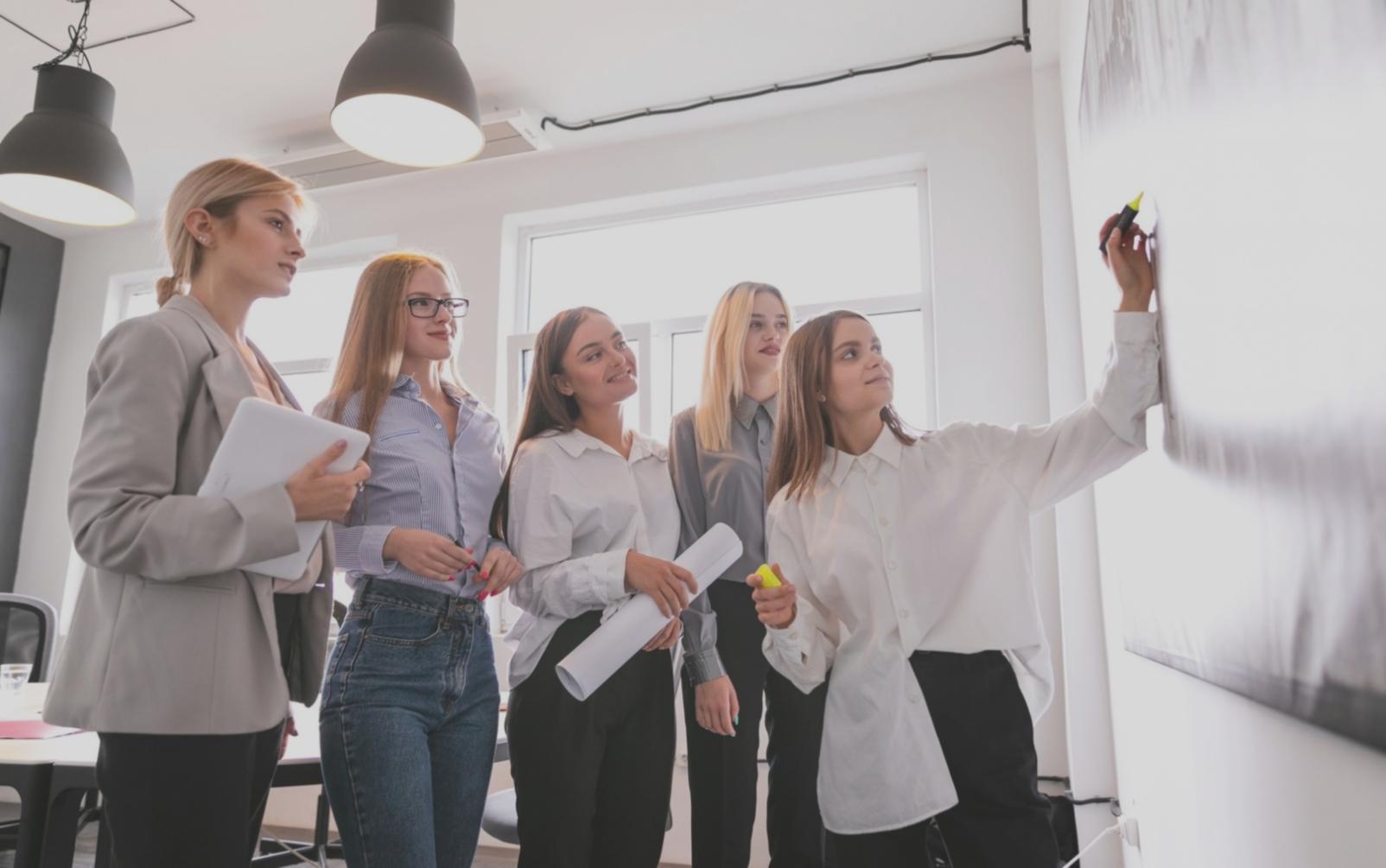 Participant working through personalized budget scenarios on tablet during zenorvexia workshop